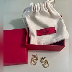Valentino Vlogo small gold earrings.